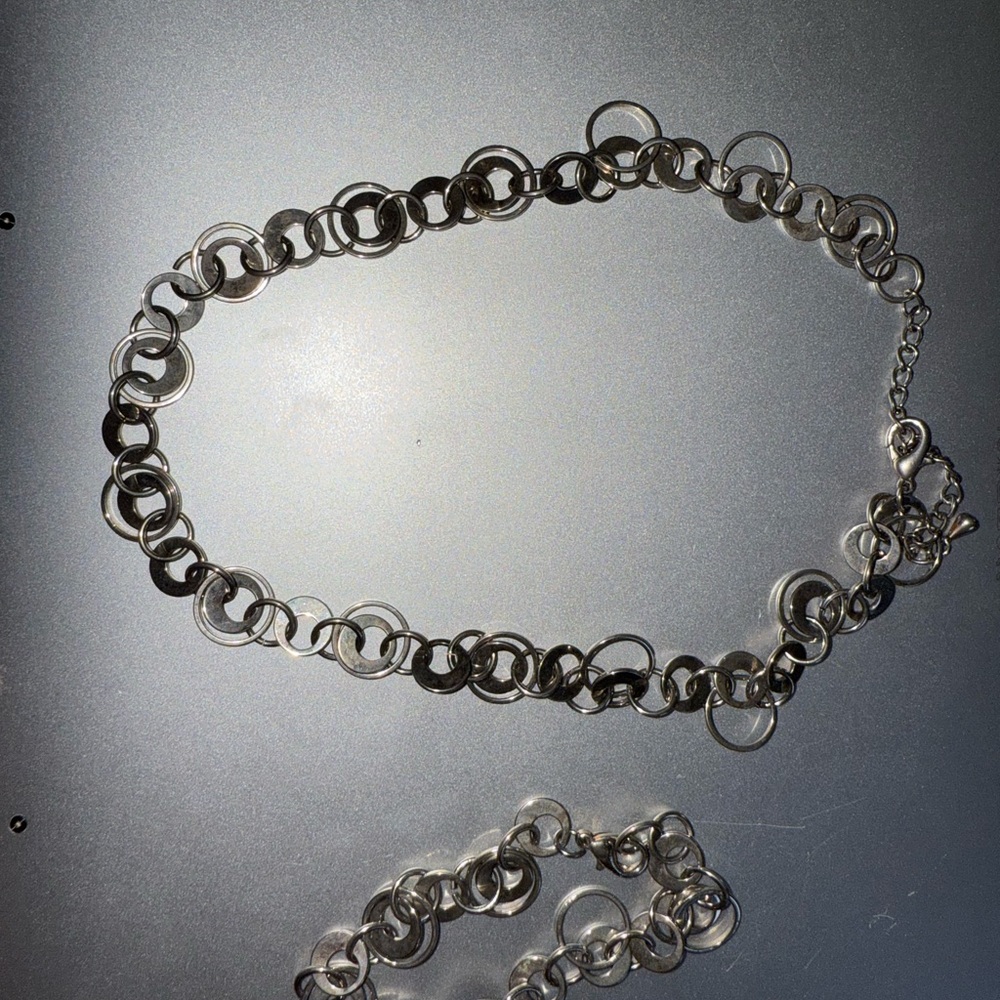Elegant Silver Necklace with Interconnected Links and matching bracelet